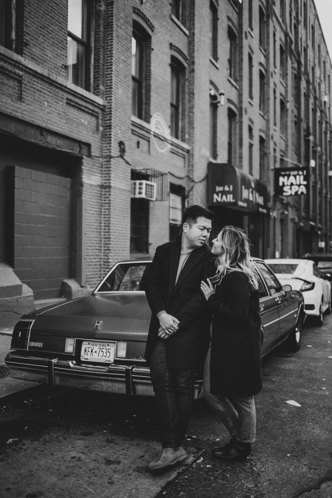 Couple during engagement photoshoot in dumbo brooklyn