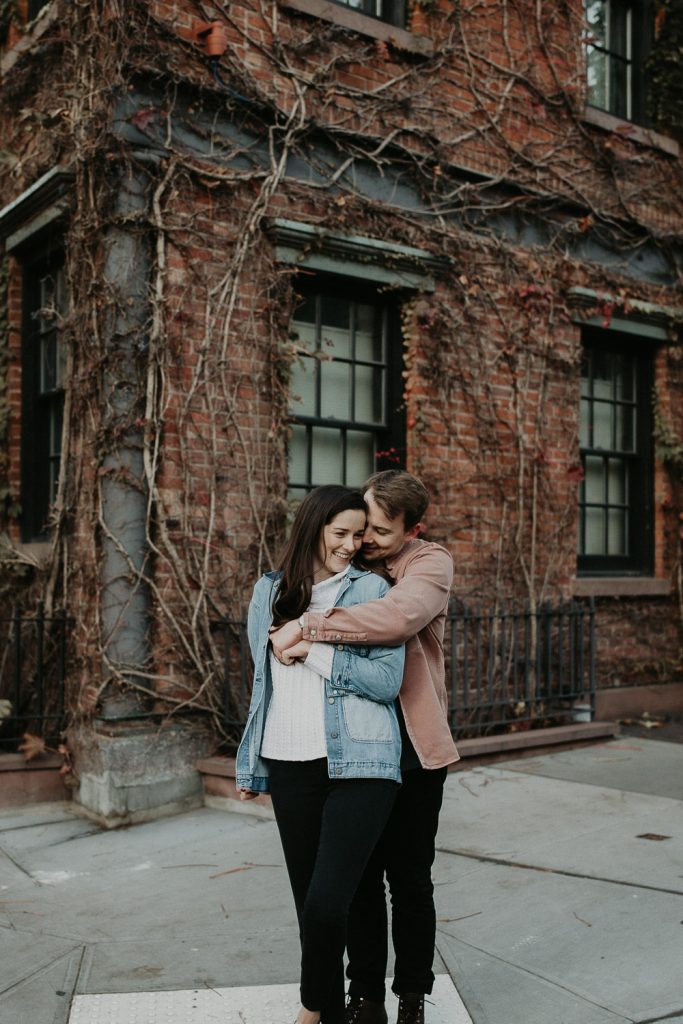 Couple during engagement shoot in the west village of nyc