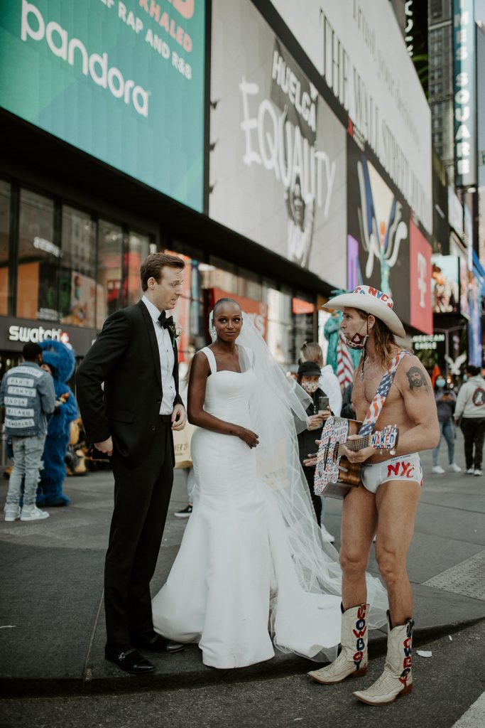 Interracial bride and groom at nyc wedding in time square