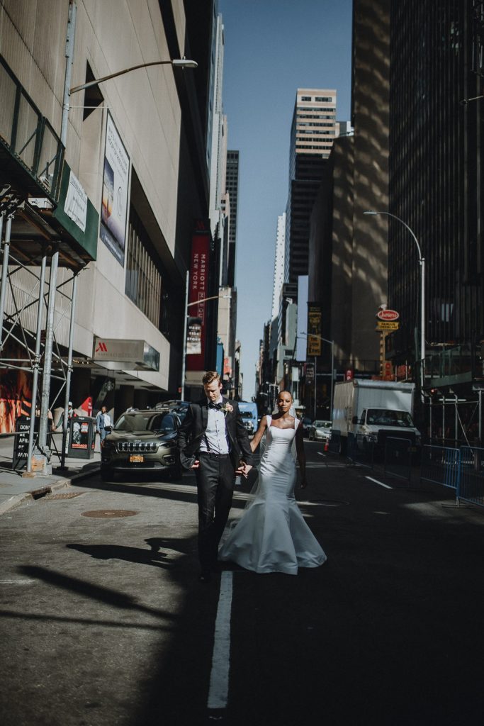 Interracial bride and groom at nyc wedding in time square