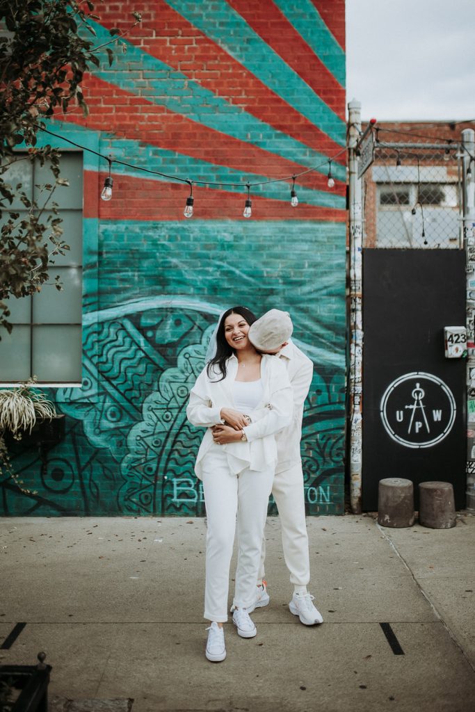 Couple during urban elopement in east williamsburg brooklyn