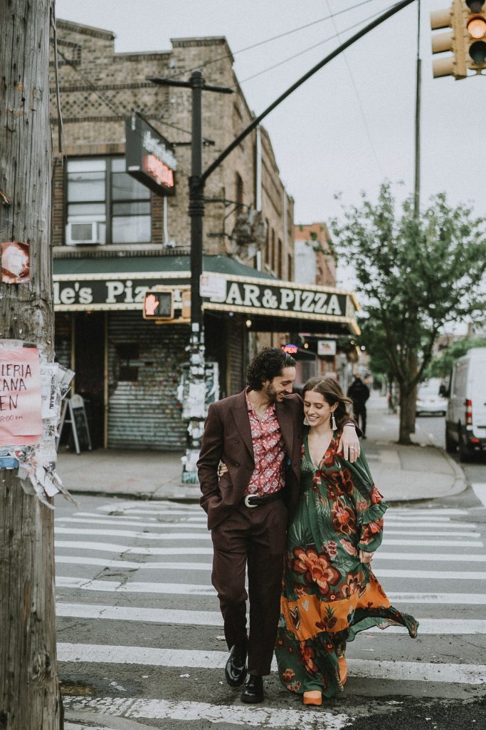 Couple crosses the street in brooklyn during elopement