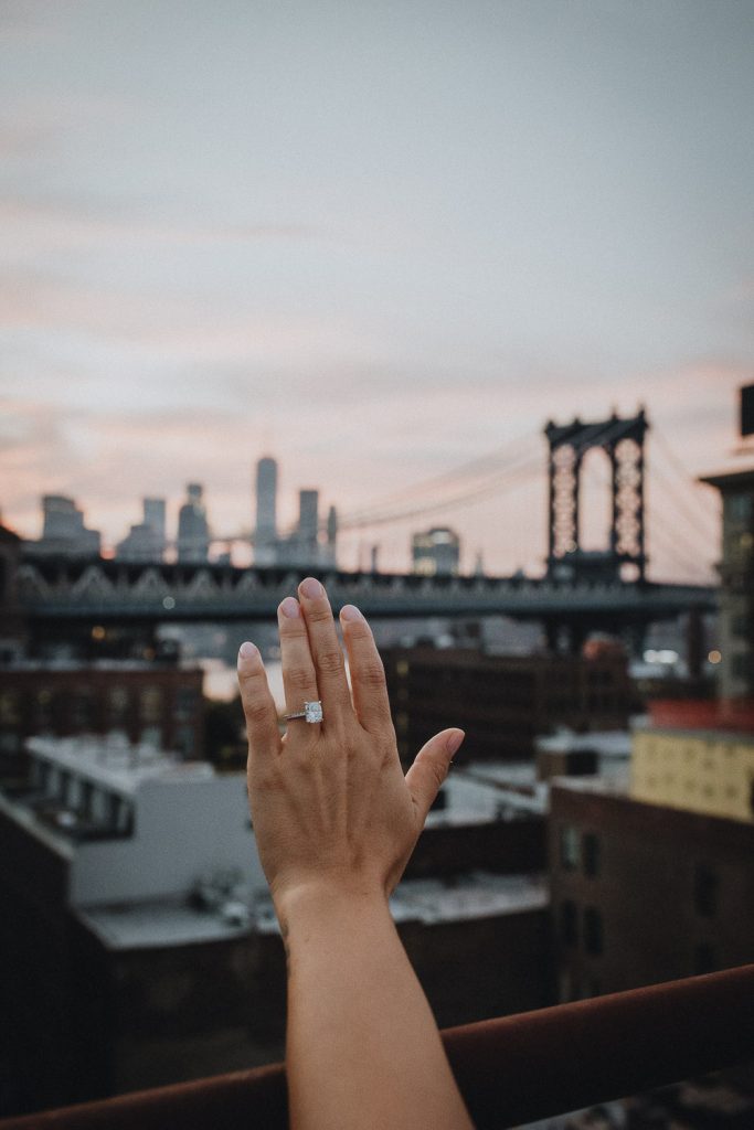 Close up of ring during dumbo rooftop engagement session