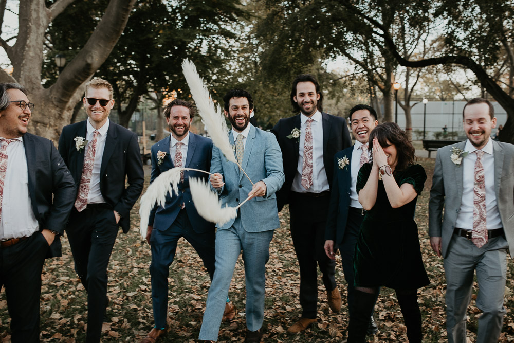Groomsmen have fun at fall brooklyn park wedding