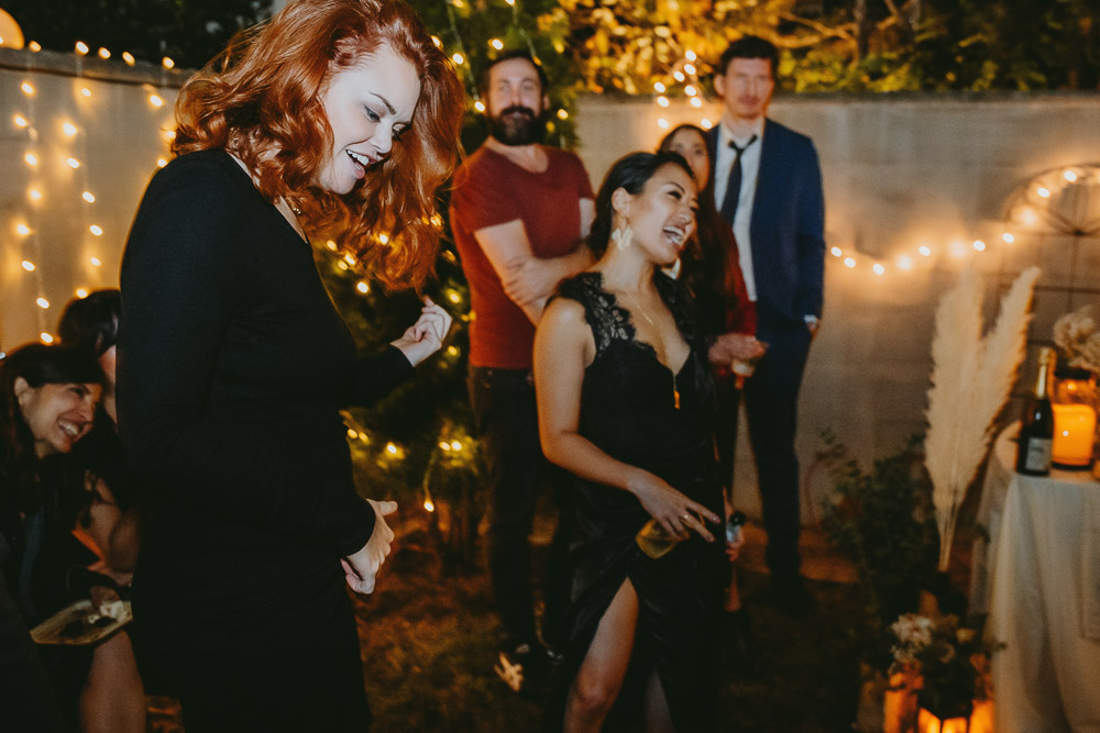 Guests dance at brooklyn backyard wedding reception