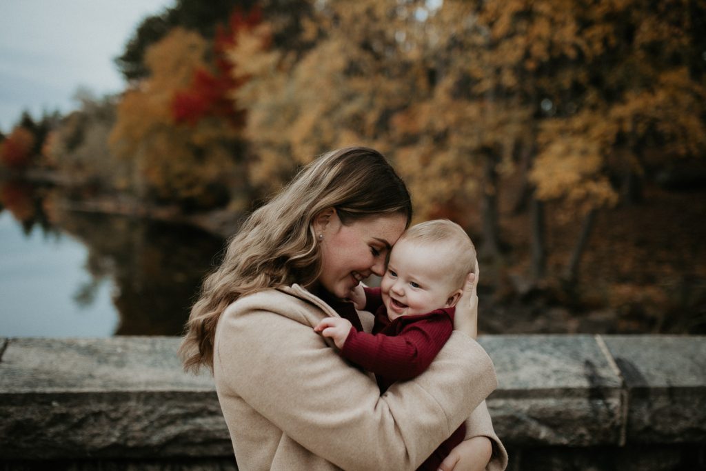 Mother and baby during fall family session in west point