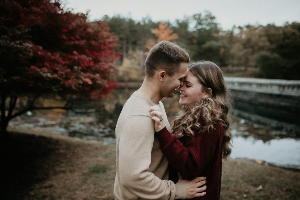 Couple during fall engagement photoshoot in west point