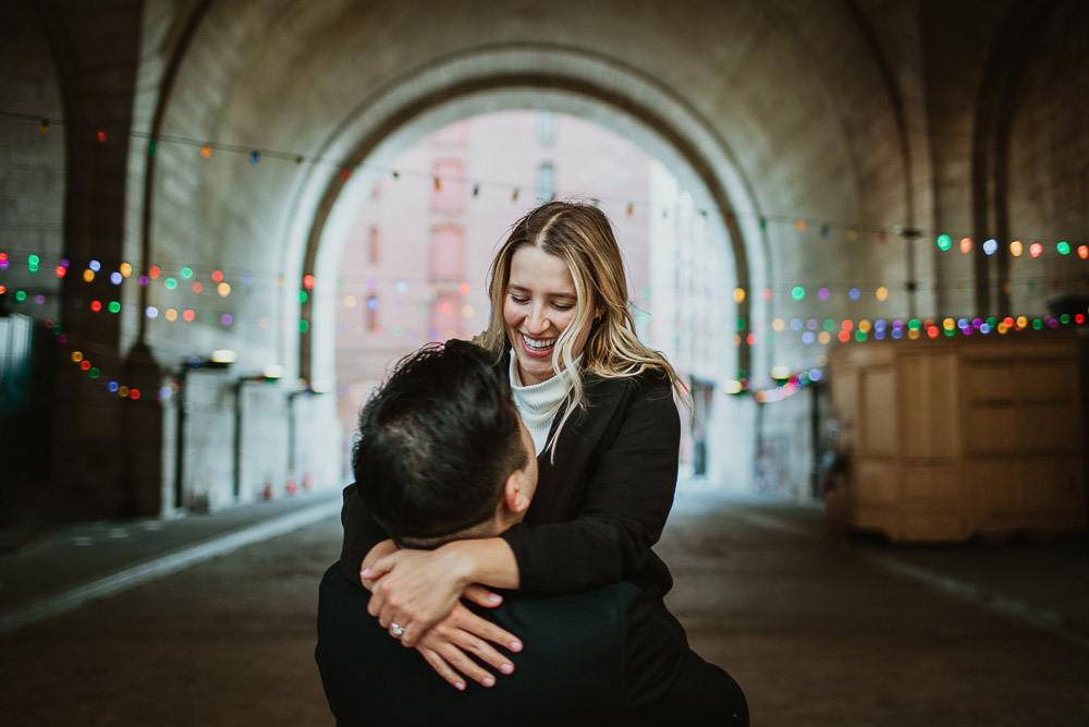 Couple during engagement photoshoot in dumbo brooklyn