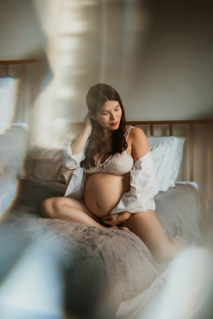Pregnant woman during maternity photoshoot at home in brooklyn