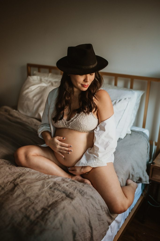 Pregnant woman during maternity photoshoot at home in brooklyn