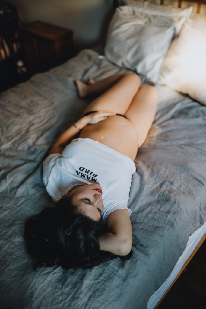 Pregnant woman during maternity photoshoot at home in brooklyn