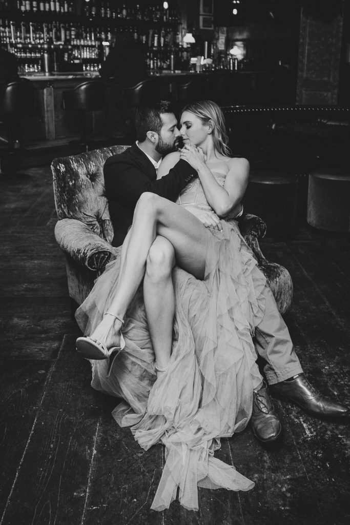Bride and groom at nyc bar during wedding reception
