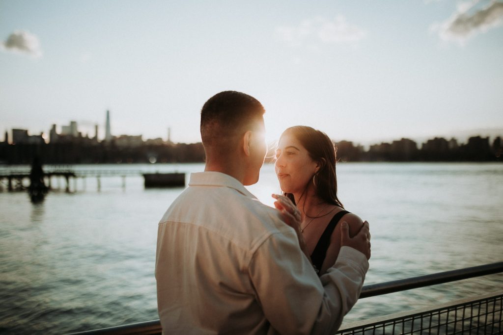 Couple during engagement photo session in williamsburg brooklyn