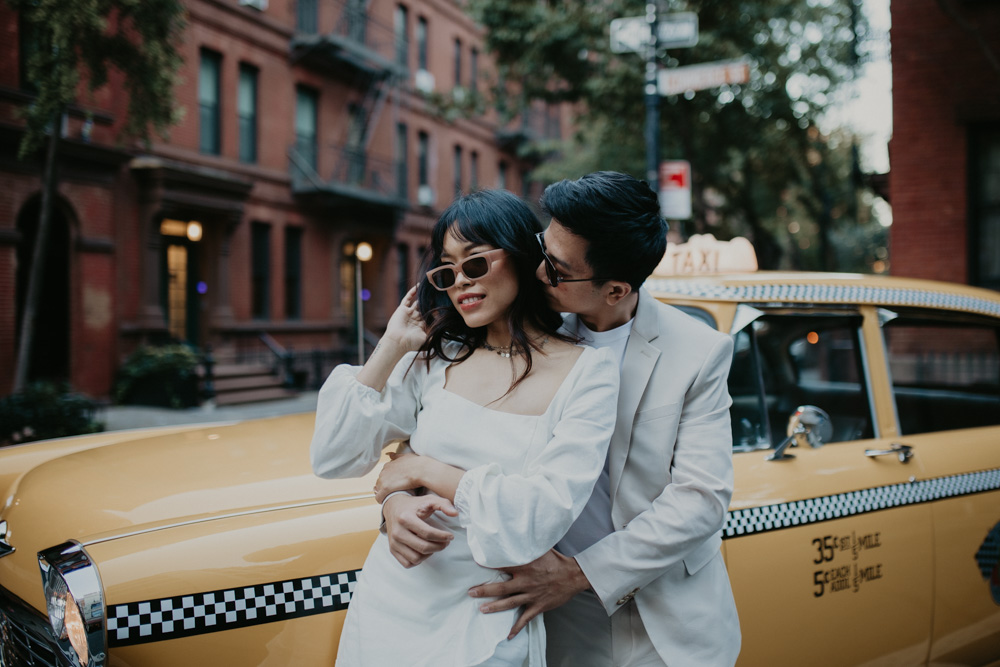 An epic New York City Elopement in Manhattan Photoshoot with a Vintage Taxi Cab.