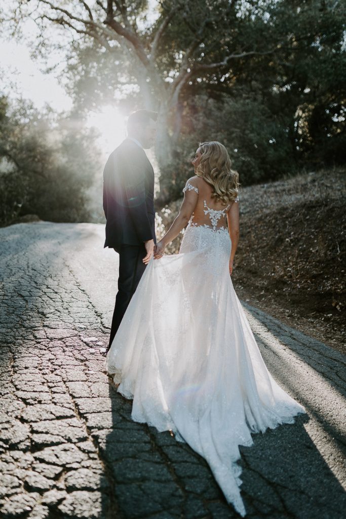 Bride and groom at golden hour in hills of los angeles