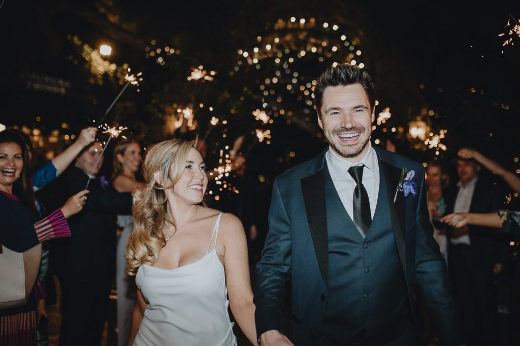 Bride and groom during sparklers exit at los angeles wedding