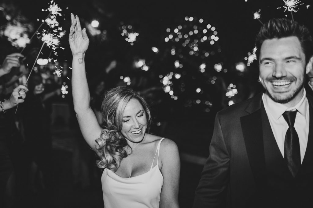 Bride and groom during sparklers exit at los angeles wedding