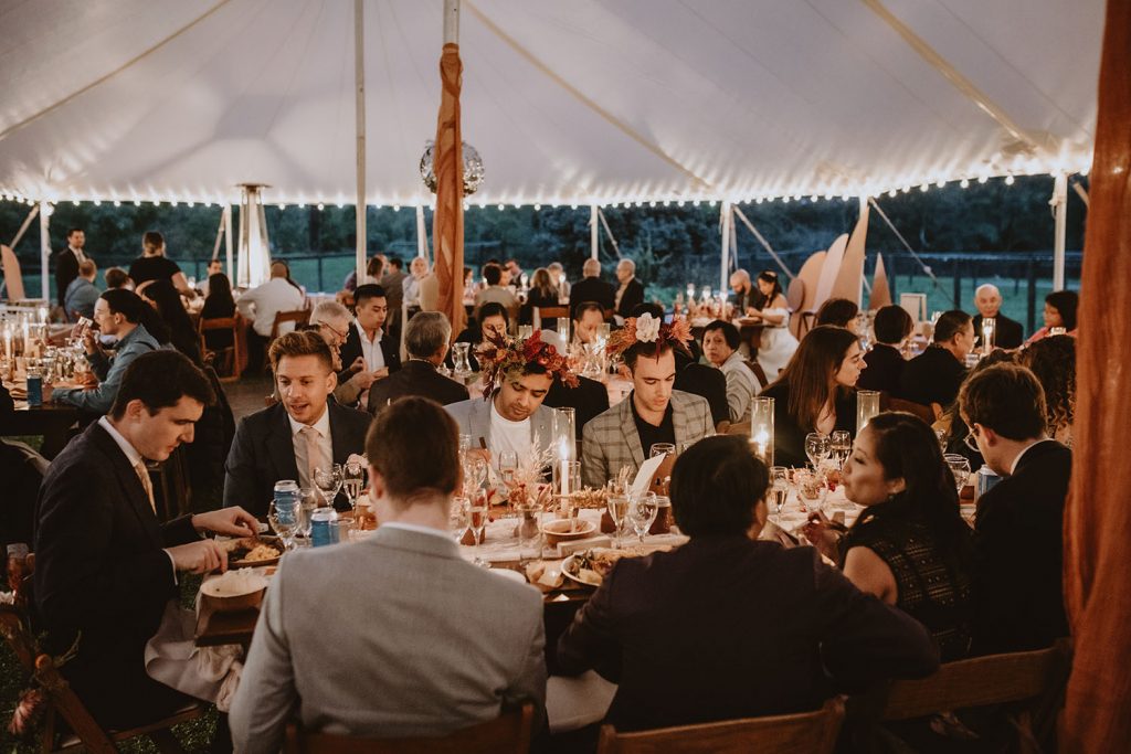 candlelit and colorful reception at Hudson Valley wedding