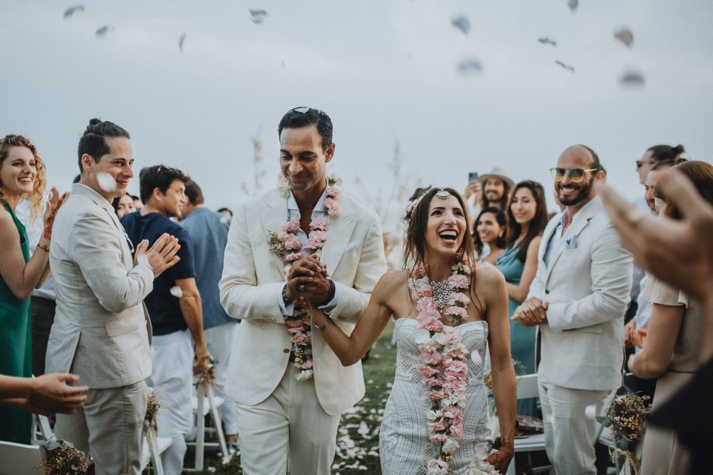 Bride and groom during ceremony at destination beach wedding in mexico