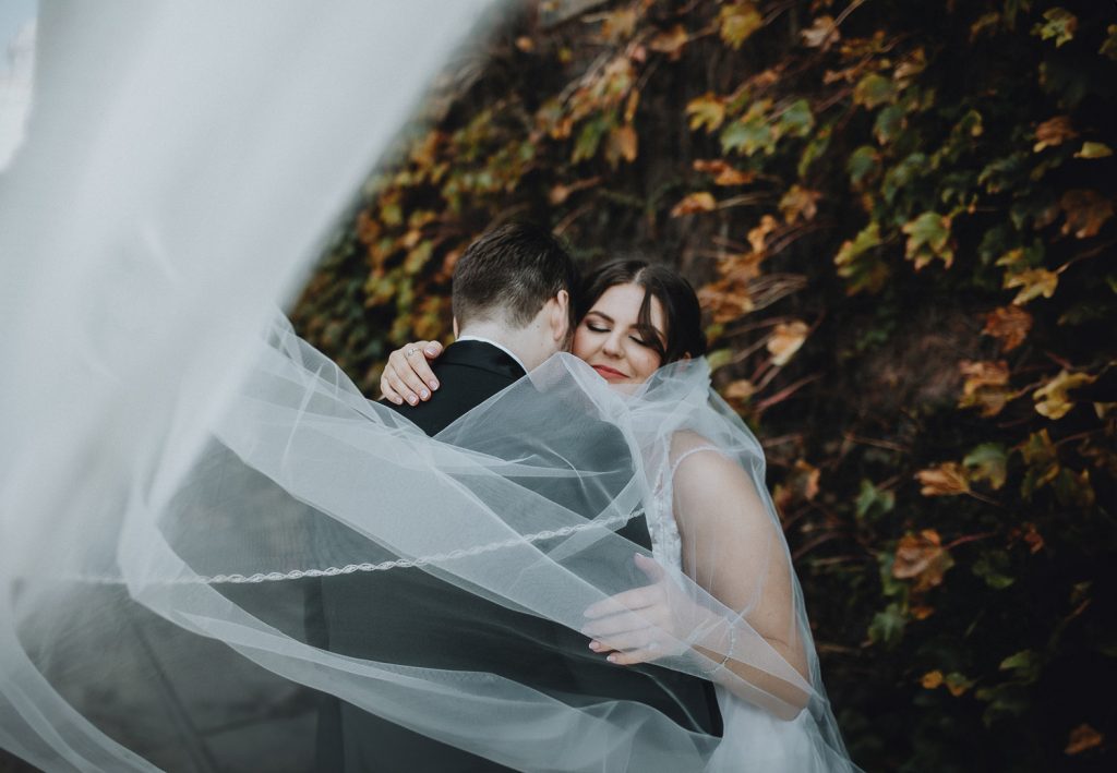Bride and groom at fall wedding at the foundry in long island city