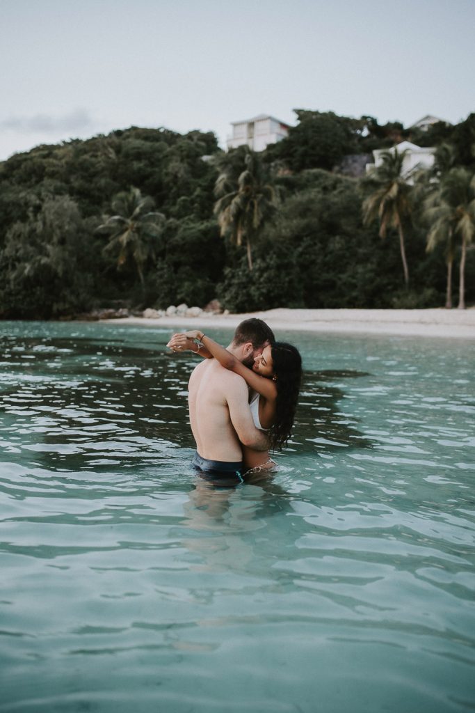 Couple photoshoot during beach hawaii elopement