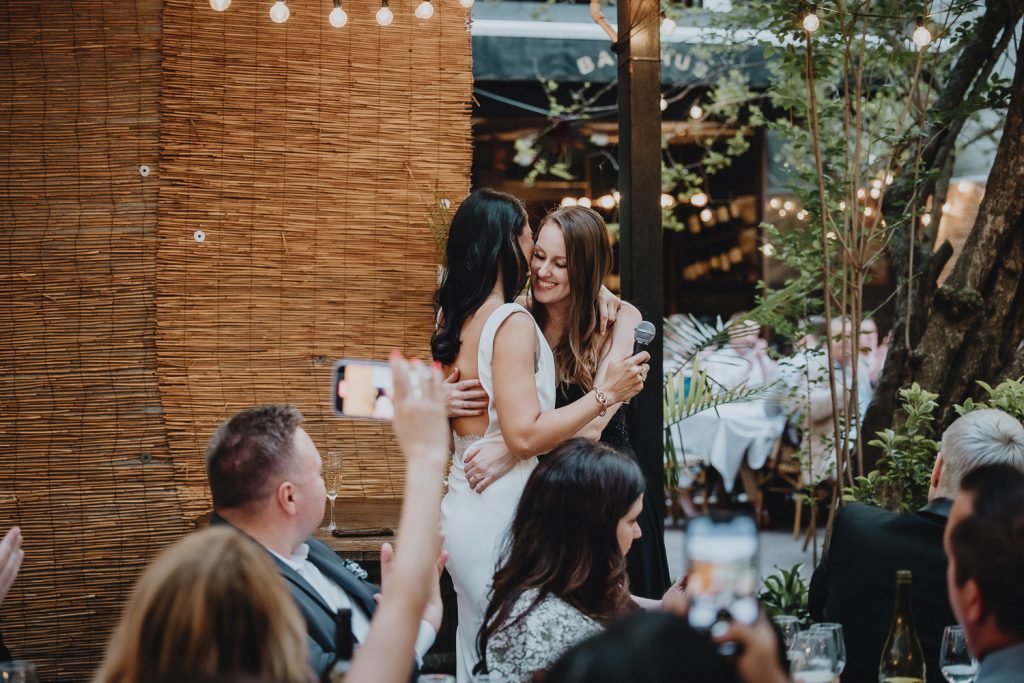 LGBTQ wedding of two brides in brooklyn restaurant