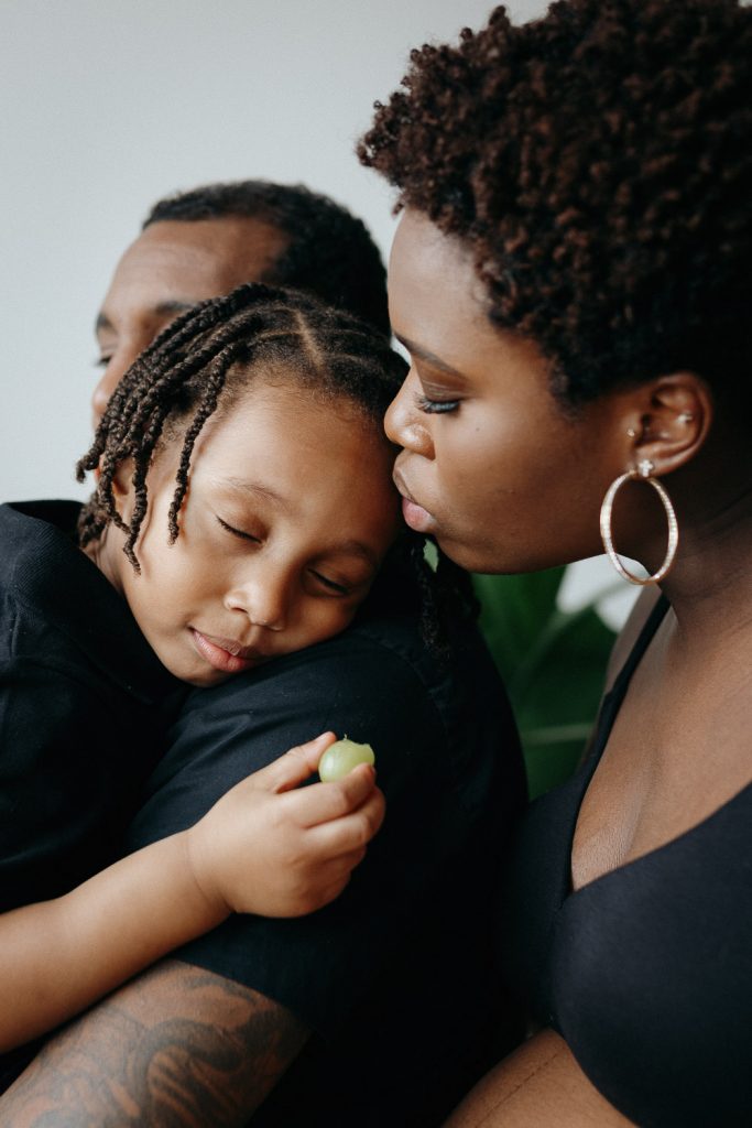 Photoshoot of black family in brooklyn studio