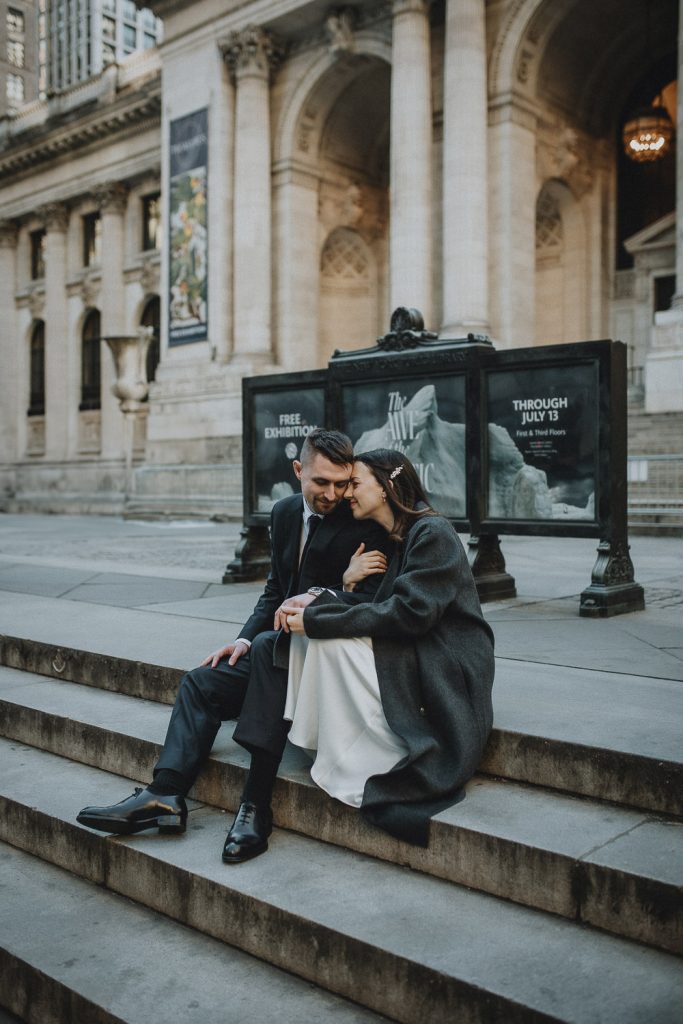 Bride and groom at new york public library on wedding day