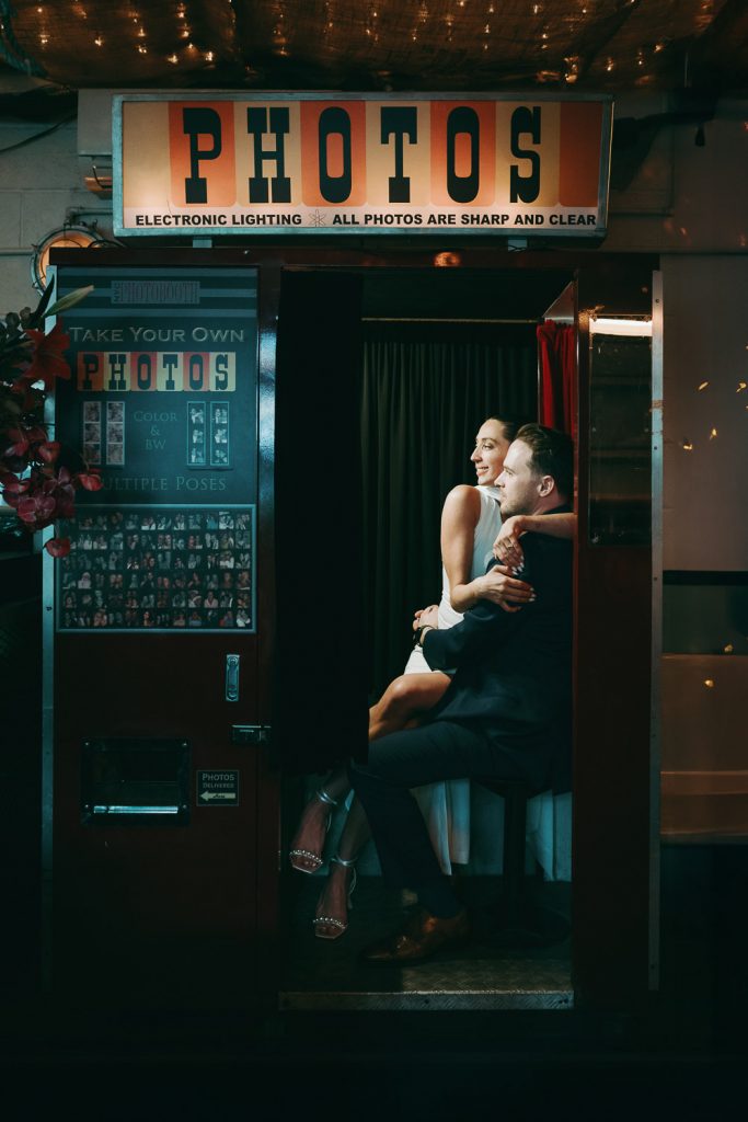 Bride and groom in photo booth during nyc wedding