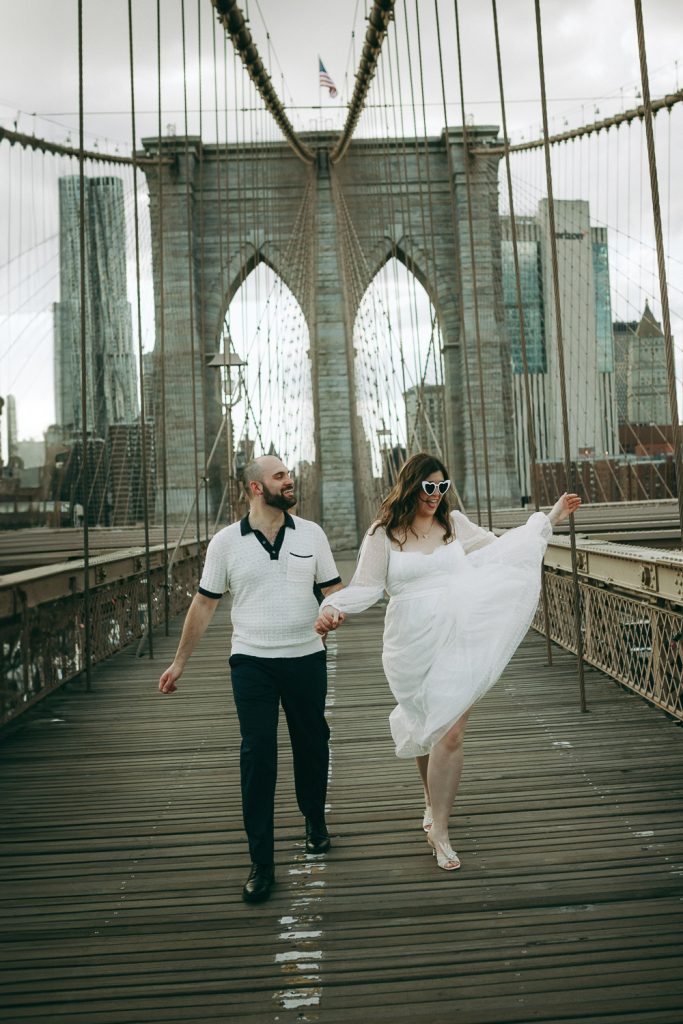 Fun engagement photoshoot on brooklyn bridge