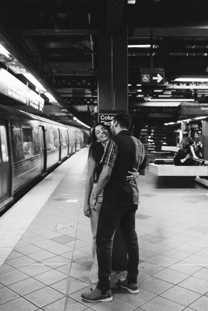 Couple during engagement photoshoot in nyc subway
