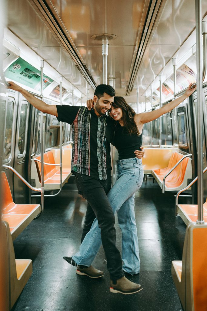 Couple during engagement photoshoot in nyc subway