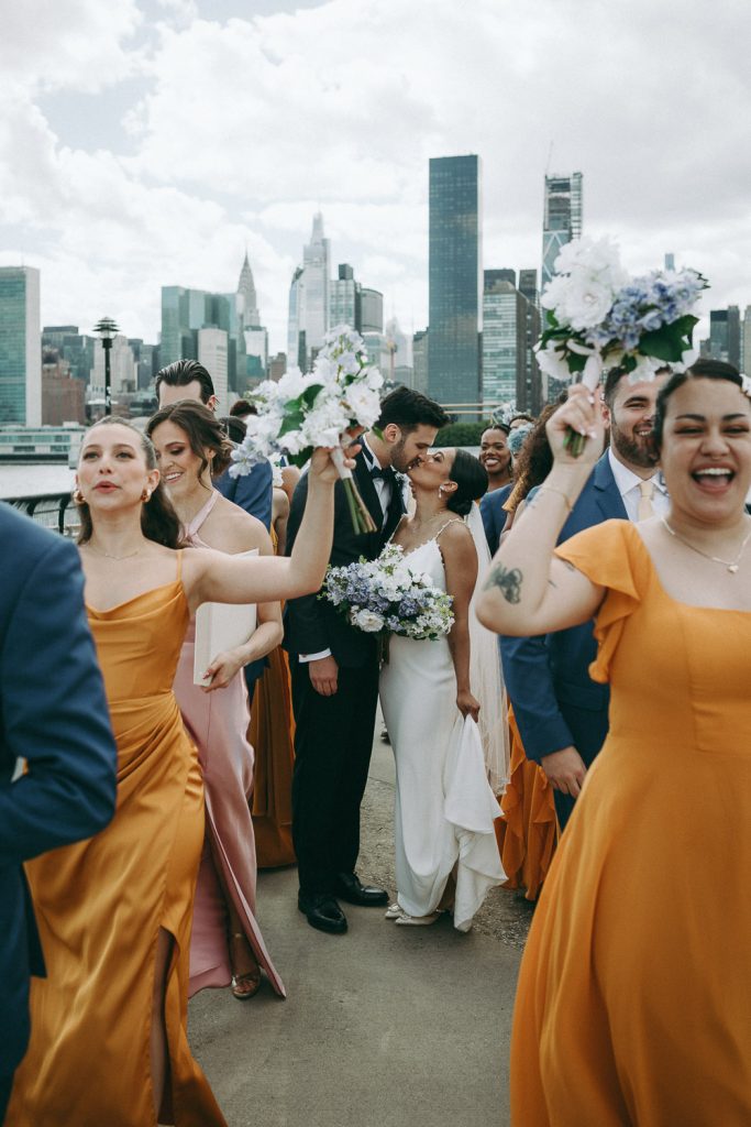 Fun bridal party photo at nyc wedding by skyline