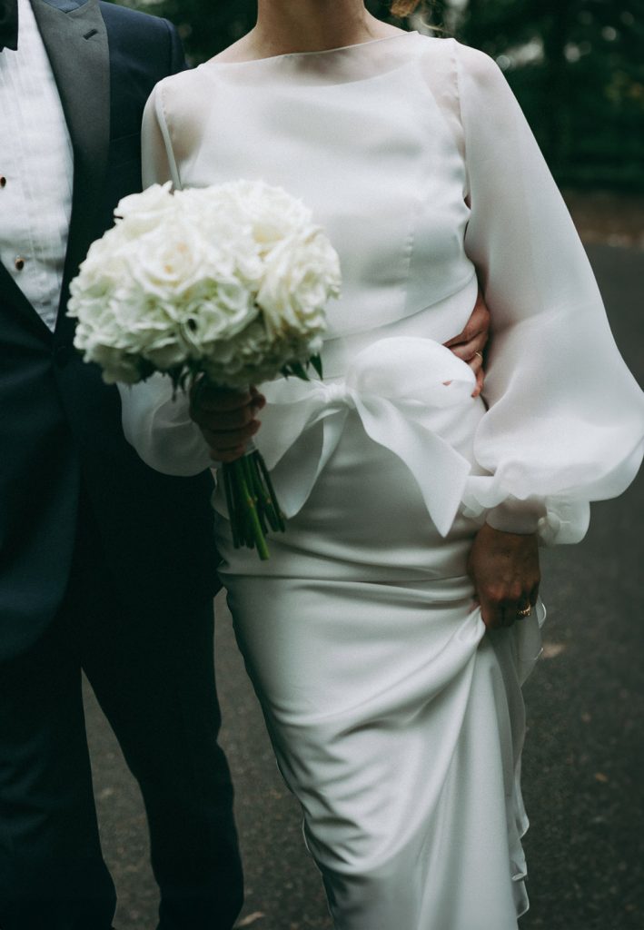 Detail shot of wedding dress with bow at nyc wedding