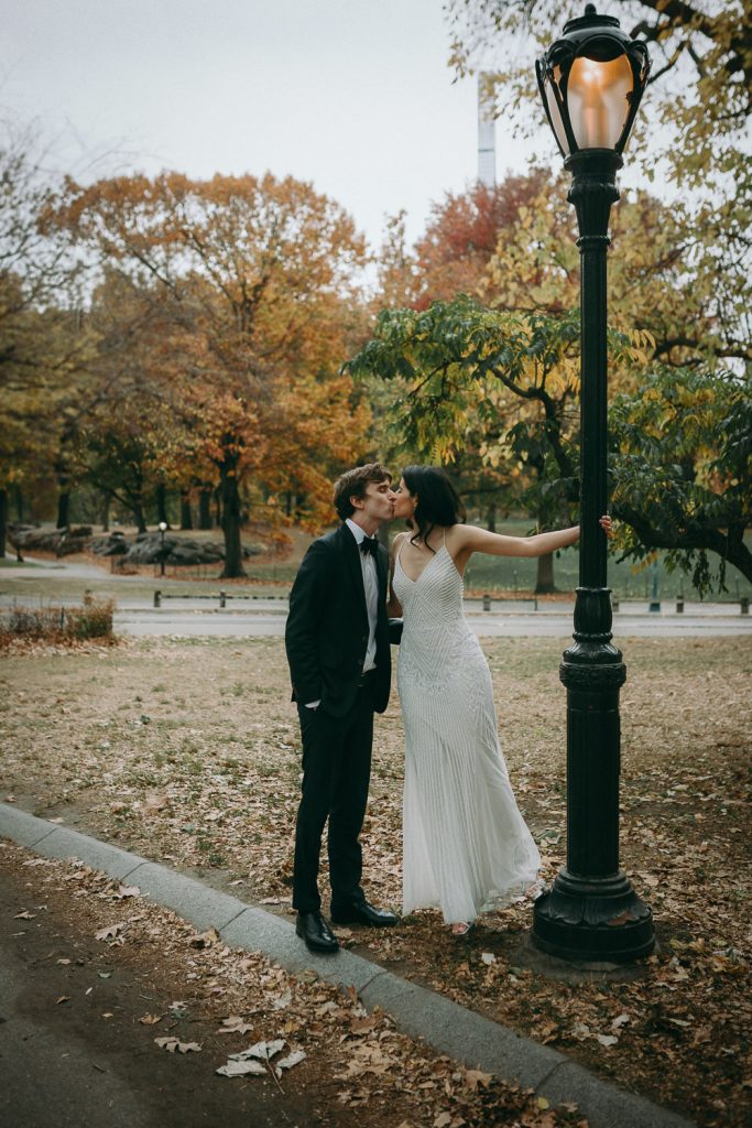 Bride and groom at fall elopement wedding in central park
