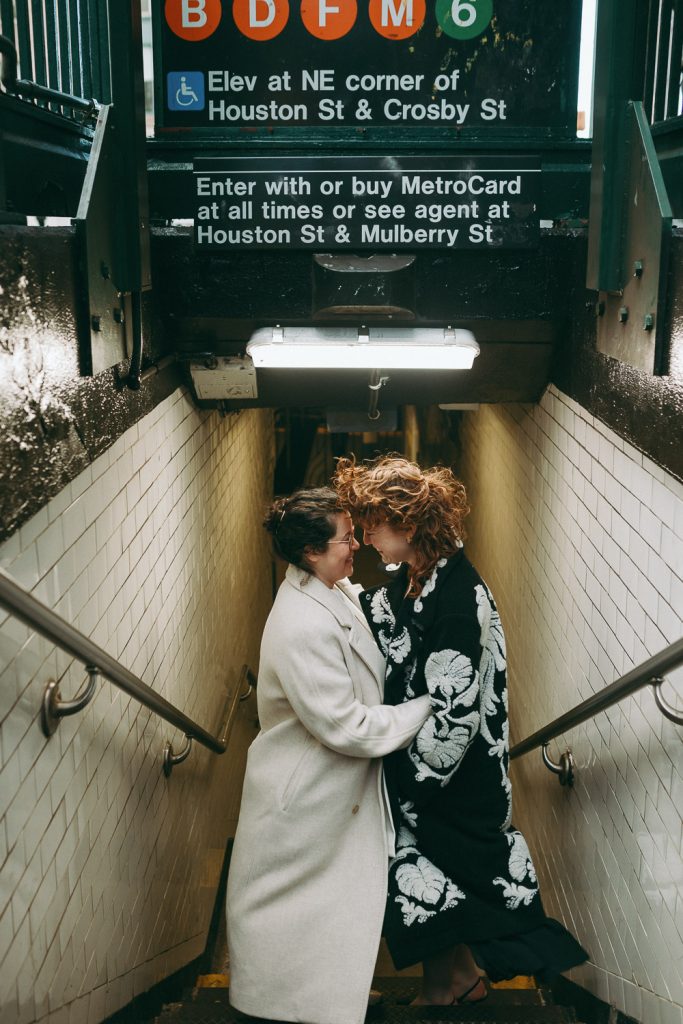 Gay couple at elopement wedding in nyc subway