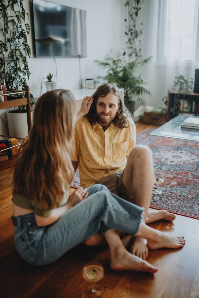 Couple during engagement session at home in nyc