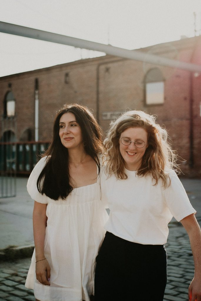 Queer couple during engagement session in brooklyn