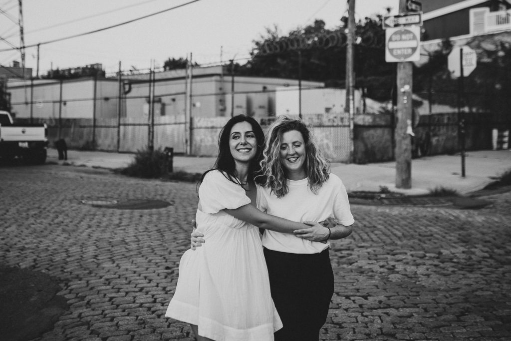 Queer couple during engagement session in brooklyn