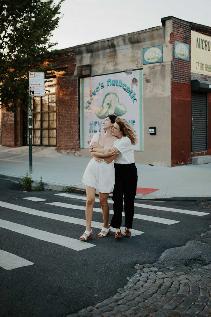 Queer couple during engagement session in brooklyn