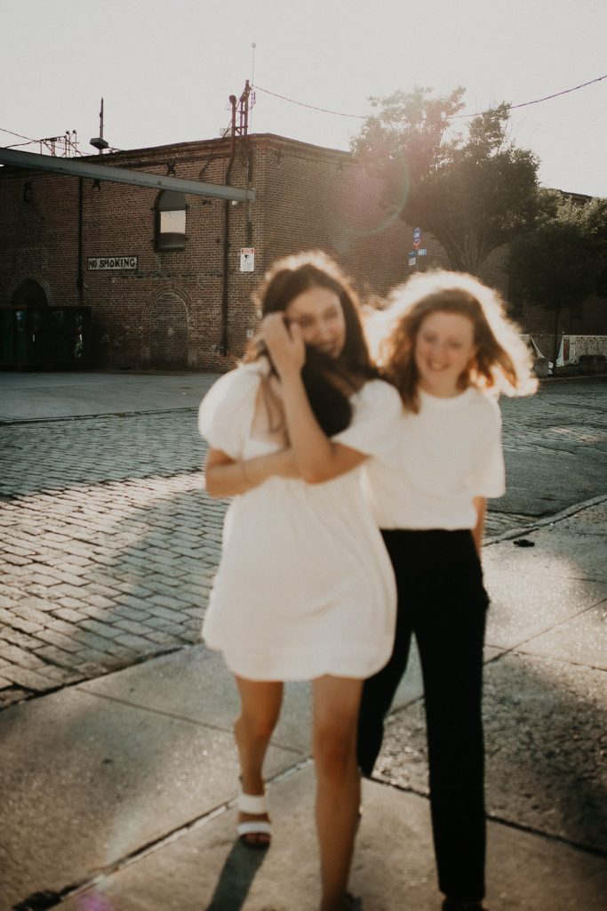 Queer couple during engagement session in brooklyn