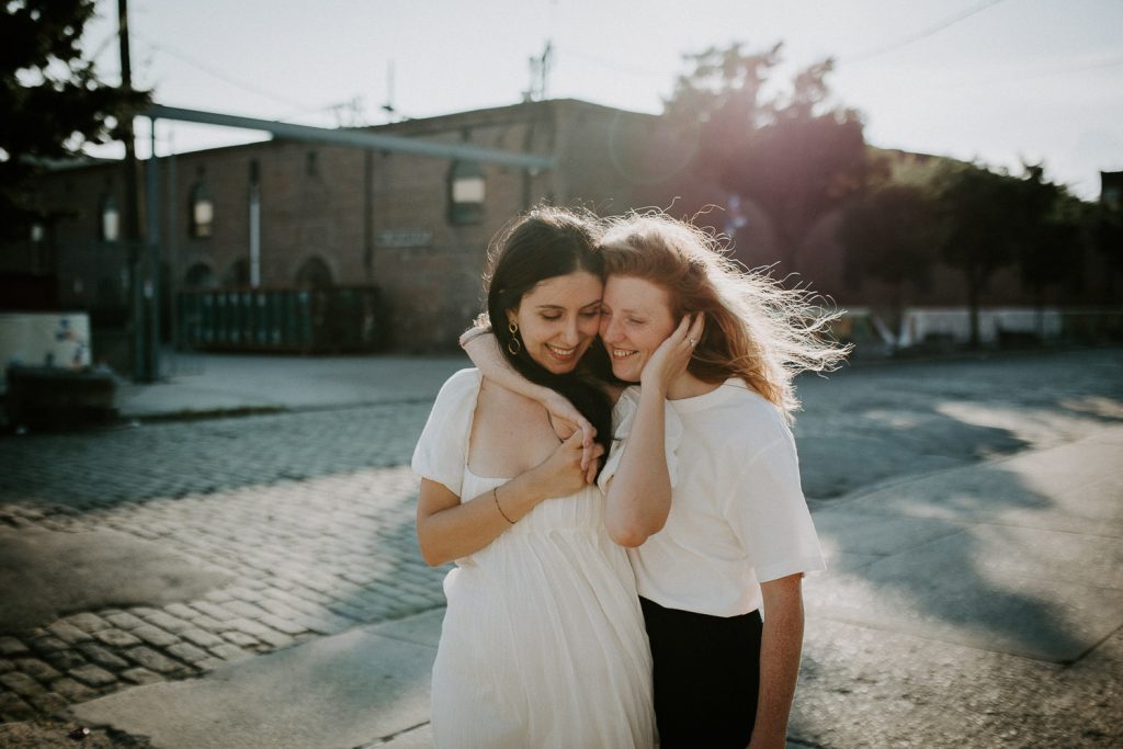 Queer couple during engagement session in brooklyn