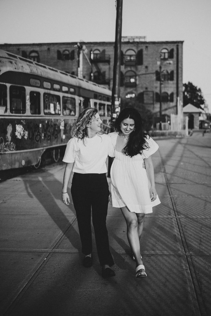 Queer couple during engagement session in brooklyn