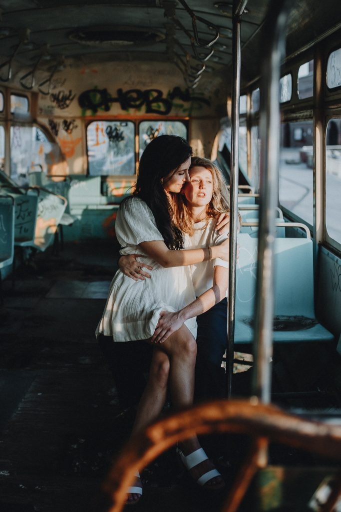 Queer couple during engagement session in brooklyn