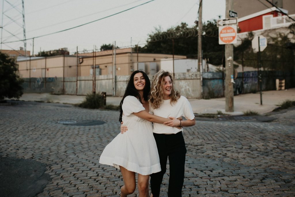 Queer couple during engagement session in brooklyn