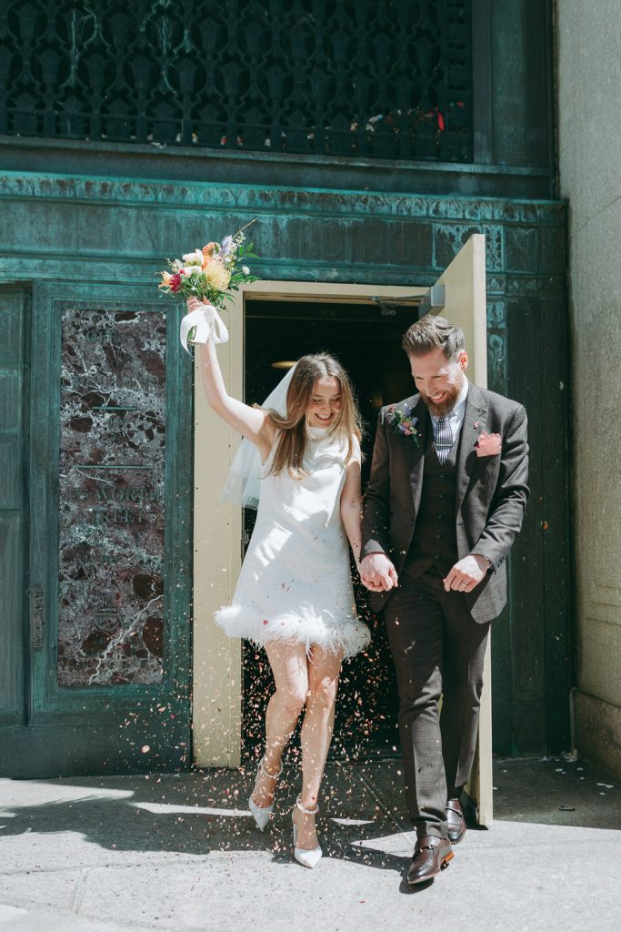 NYC city hall wedding elopement with confetti