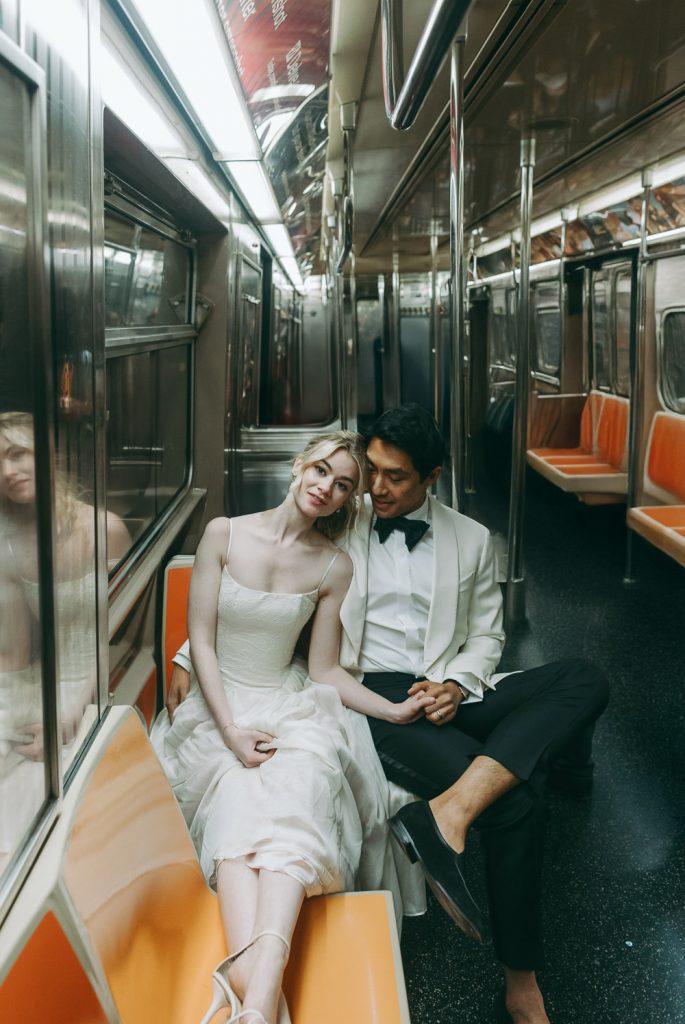 Bride and groom in nyc subway during nyc elopement wedding