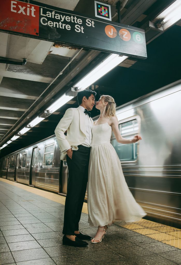 Bride and groom in nyc subway during nyc elopement wedding